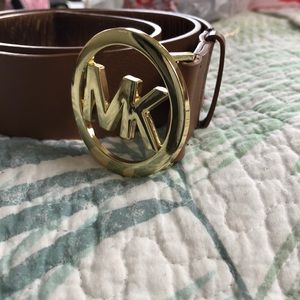 Michael Kors belt size M selling for 32 dollars